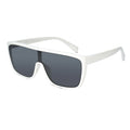 Gold-framed sunglasses with black lenses on a white background