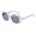 Sunglasses with gold frame and purple gradient lenses on a white background