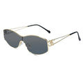 Aviator-style sunglasses with a gold metal frame, dark gray lenses, and black temple tips, shown on a plain white background.