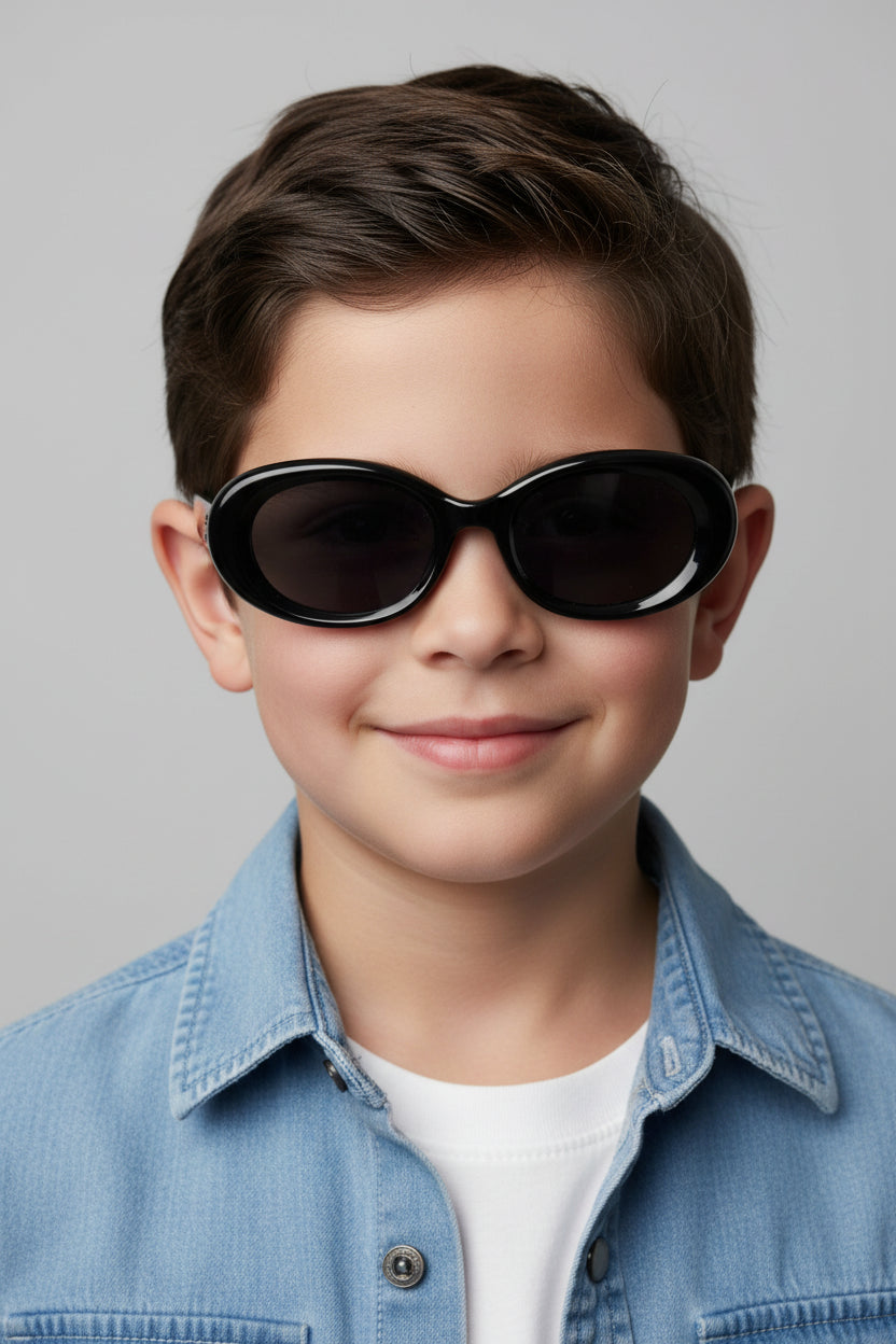Oval sunglasses with a glossy black frame and dark gray lenses, shown at an angle on a white background.