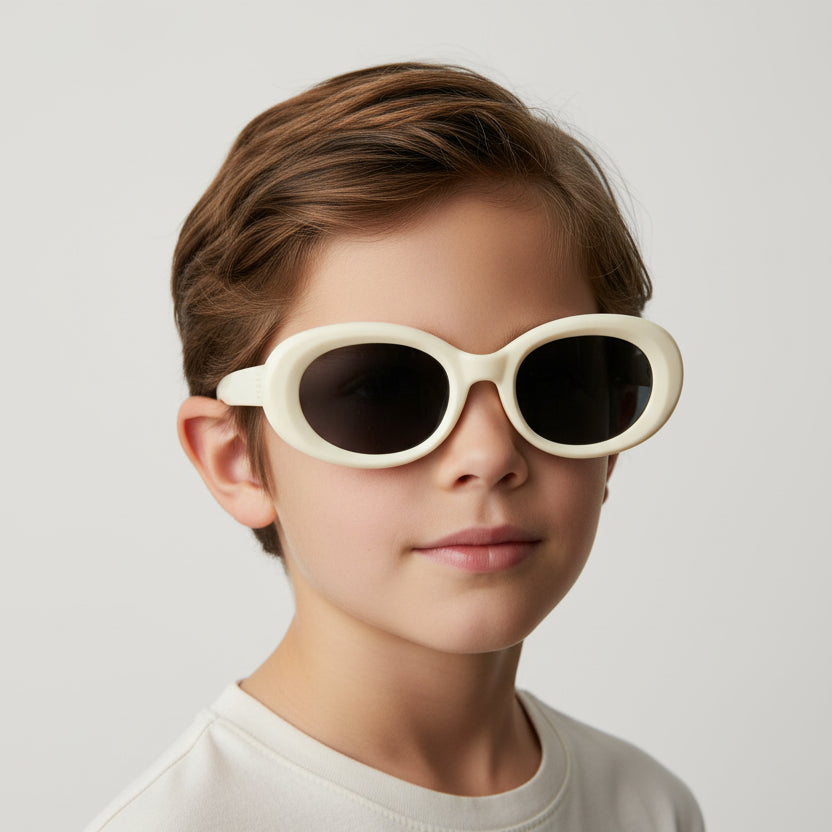 Oval sunglasses with a glossy cream-colored frame and dark gray lenses, shown on a plain white background.