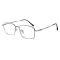 Rectangular metal eyeglasses with a thin silver-tone frame and black temple tips, shown on a plain white background.