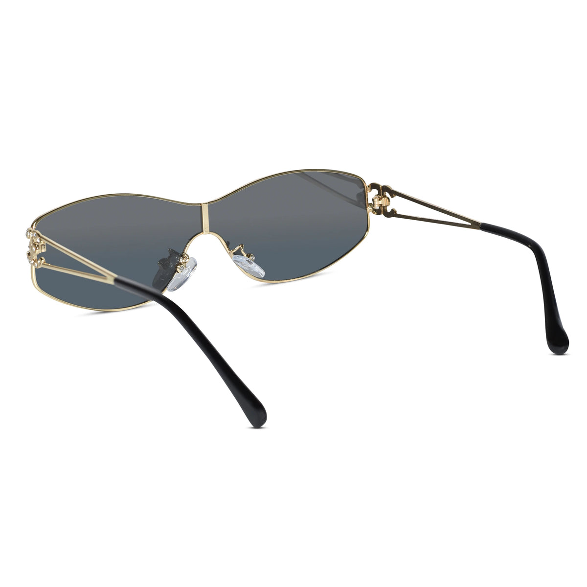 Oversized cat-eye sunglasses with a gold metal frame, dark gray gradient lenses, and black temple arms on a white background.