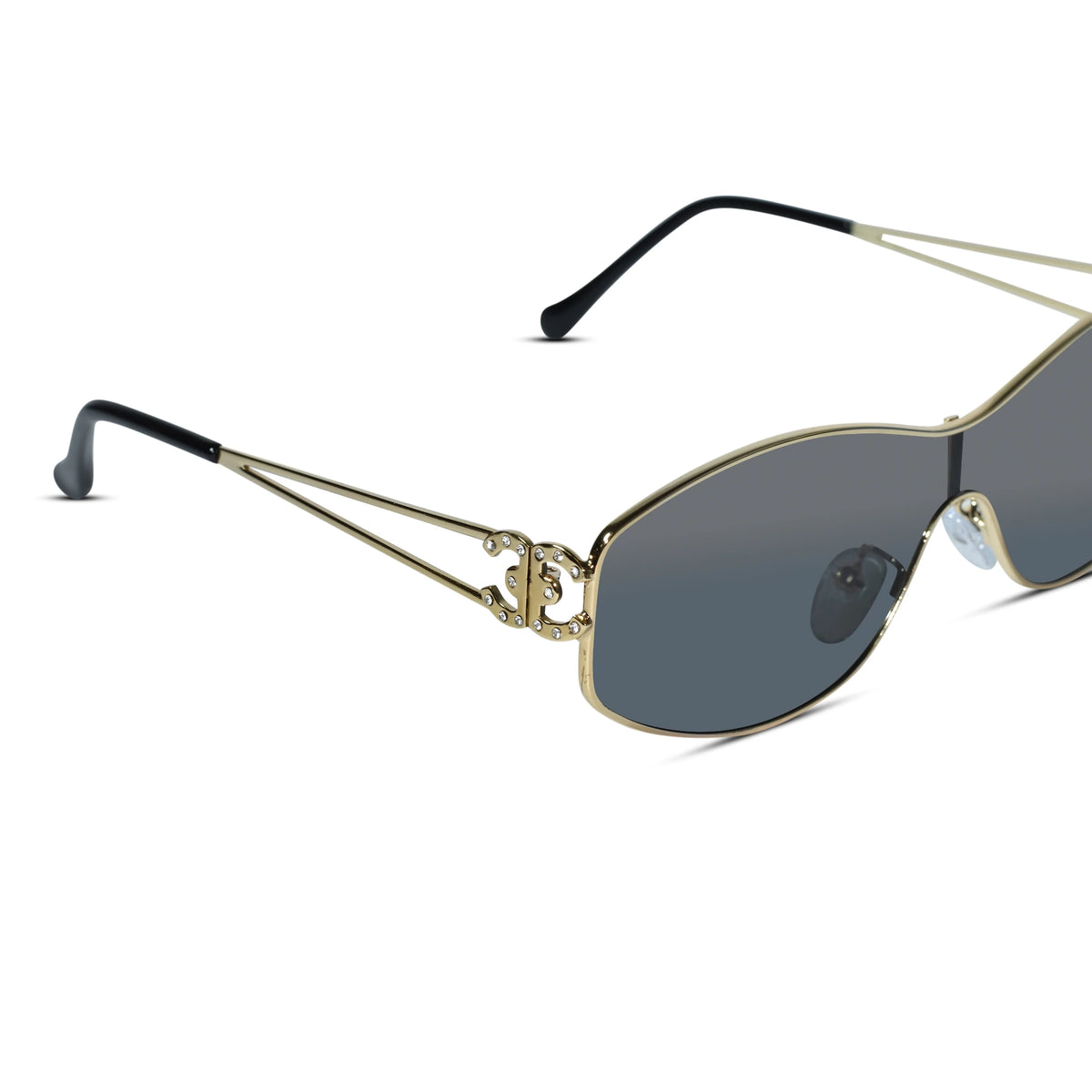 Gold metal rimless sunglasses with dark gray lenses and black temple tips, shown on a plain white background.