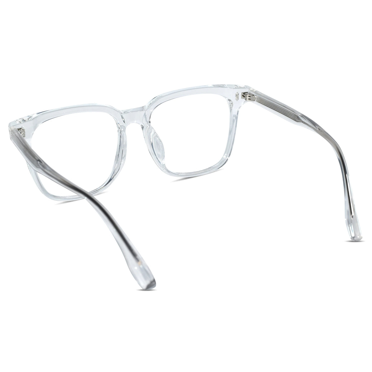 Clear acetate square eyeglasses with transparent lenses and silver metal hinges, shown from a three-quarters angle on a white background.