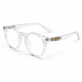 Clear acetate round eyeglasses with gold metal accents on the hinges, displayed on a clean white background.